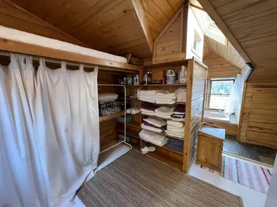 a room with towels and a curtain in a house at 3 Bedroom - Awesome Views, Light, Deck in Idaho Springs