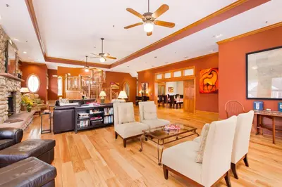 a living room with a couch and a table at The Bradley Boulder Inn in Boulder