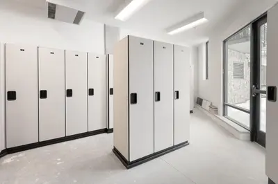 a row of white lockers in a room at Timber Fox 1208 apts in Winter Park