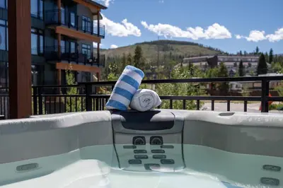a towel sitting on the edge of a swimming pool at Timber Fox 1208 apts in Winter Park