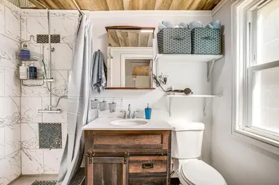 a bathroom with a sink and a toilet at Aurora Abode 7 Mi to Dtwn Denver! in Aurora