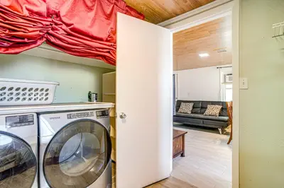 a room with a washer and dryer in a house at Aurora Abode 7 Mi to Dtwn Denver! in Aurora