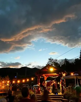 a crowd of people at an outdoor market at night at River Mountain Getaway-private, large, in- law apt in Jamestown