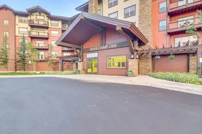 an empty street in front of a building at Ski-InandSki-Out and Pool Access Granby Ranch Gem in Granby