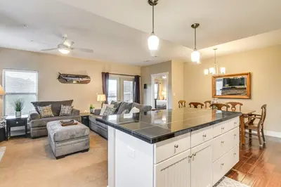 a kitchen and living room with a large island at Ski-InandSki-Out and Pool Access Granby Ranch Gem in Granby