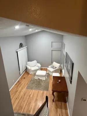 a living room with a couch and a table at Charming Broomfield Home Close To Everything! in Broomfield