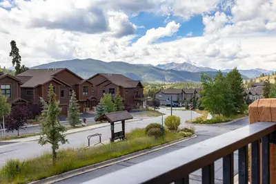 a view from the balcony of a home with a mountain at Antlers Gulch Retreat townhouse in Keystone