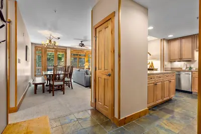 a kitchen and dining room with a table and chairs at Timbers 3064 : 2 in Keystone
