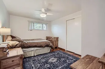a bedroom with two beds and a window at Vaulted Ceilings, Natural Light Apt near Olde Town in Arvada
