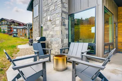 two chairs sitting on the porch of a house at Mtn-View Slopeside Chalet in Granby Ranch! in Granby