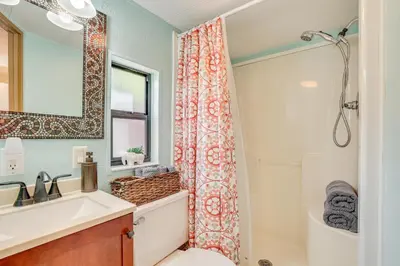a bathroom with a shower and a toilet and a sink at 4 Mi to Ski Resort Pet-Friendly Breck Cabin in Breckenridge