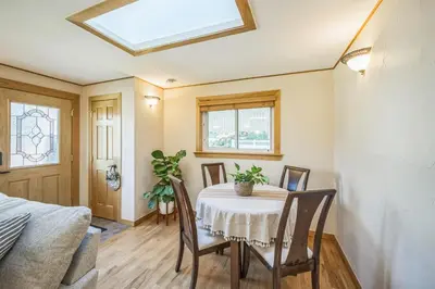 a dining room with a table and chairs at Bright & Cozy House Centennial Littleton 4 Bed 3 Bath in Centennial