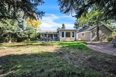 a small house with a patio and a yard at Bright & Cozy House Centennial Littleton 4 Bed 3 Bath in Centennial