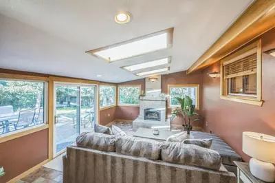 a living room with a couch and a fireplace at Bright & Cozy House Centennial Littleton 3 Bed 3 Bath in Centennial