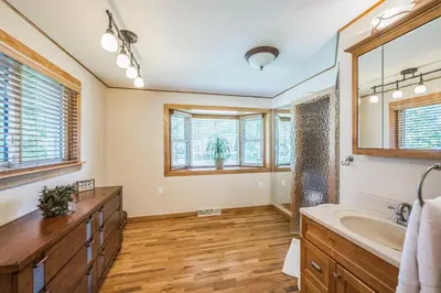 a large bathroom with a sink and a mirror at Bright & Cozy House Centennial Littleton 3 Bed 3 Bath in Centennial