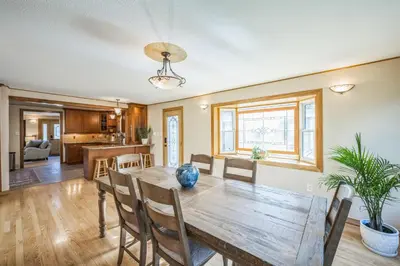 a dining room with a wooden table and chairs at Bright & Cozy House Centennial Littleton 3 Bed 3 Bath in Centennial