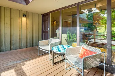 a patio with chairs and a table on a deck at Mtn-View Frisco Home Near Skiing and Hiking! in Frisco