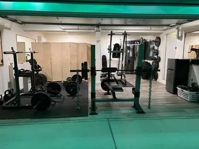 a gym with lots of equipment in a room at Hot Tub Steam Shower Gym in Charming Family Home! in Lafayette