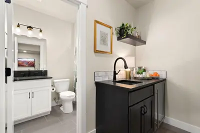 a bathroom with a sink and a toilet at Scenic Mountain Retreat Golf, Pickleball, Relax in Loveland