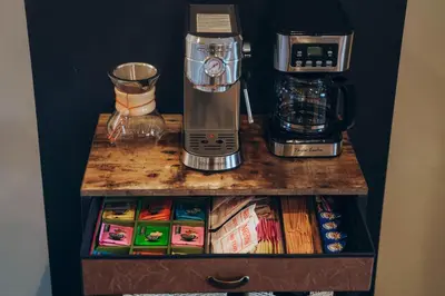a counter with a blender on top of it at WinterPark, Ski, CoffeeBar, Pets and CommunalHotTub in Winter Park