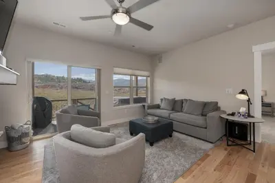 a living room with a couch and chairs at Wagon Wheel at Rendezvous home in Fraser