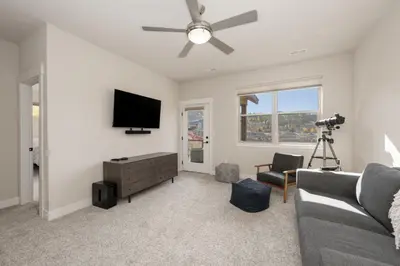 a living room with a couch and a television at Wagon Wheel at Rendezvous home in Fraser