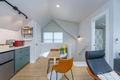 a kitchen and dining room with a table and chairs at Denver guesthouse w patio near Schafer Park in Denver