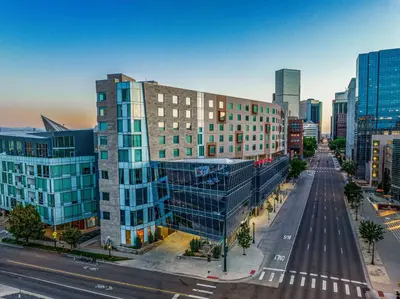 an aerial view of a building in a city at The Art Hotel Denver, Curio Collection by Hilton in Denver