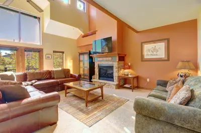 a living room with couches and a fireplace at A2 Marina Park 3Br 3,5Ba condo in Frisco