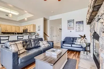a living room with a couch and a table at 152 Ponds on the Blue River home in Silverthorne