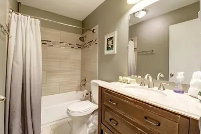 a bathroom with a tub and a toilet and a sink at 334 Willow Lake Ct, 4Br withloft 3Ba townhouse in Silverthorne