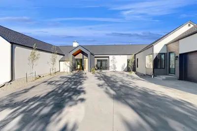 an empty driveway in front of a house at Valley View Retreat | Main House in Tabernash