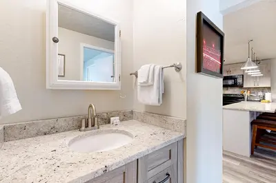 a bathroom with a sink and a mirror at Summit Serenity in Dillon