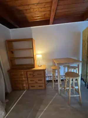 a bedroom with a desk and a table and chairs at Large Studio LIGHT & VIEWS - Beautiful with Deck - Message Direct in Idaho Springs