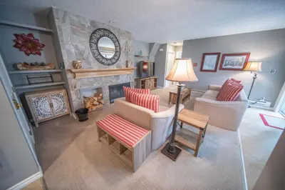 an aerial view of a living room with a fireplace at Flying Dutchman 1110 by SummitCove Lodging in Keystone