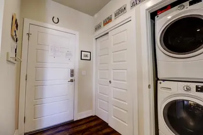 a laundry room with a washer and dryer at Sail Lofts 101 condo in Dillon