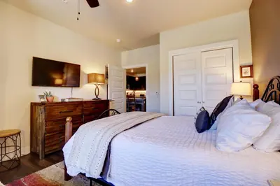 a bedroom with a bed and a tv on the wall at Sail Lofts 101 condo in Dillon