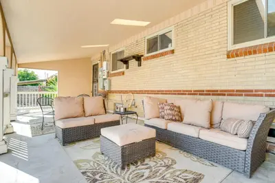 a patio with two couches and a table at 6 Mi to Dtwn Denver Escape with Fire Pit in Denver