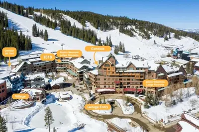 an aerial view of a resort in the snow at Ski-In Ski-Out Condo at Zephyr Mountain Lodge 1518 in Winter Park