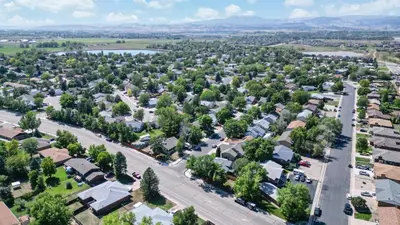 an aerial view of a small town with houses at RMNP Retreat Group Friendly Home near Estes Park in Loveland