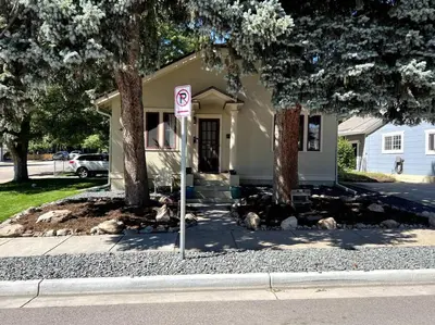 a no parking sign in front of a house at Walk to Dining Breweries and Shops Plus New Hot Tub in Louisville