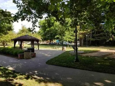 a park with a gazebo in a park at Walk to Dining Breweries and Shops Plus New Hot Tub in Louisville