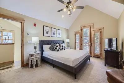 a bedroom with a bed and a ceiling fan at 6507 Settlers Creek Townhomes townhouse in Keystone