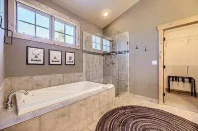 a large bathroom with a tub and a shower at 6507 Settlers Creek Townhomes townhouse in Keystone