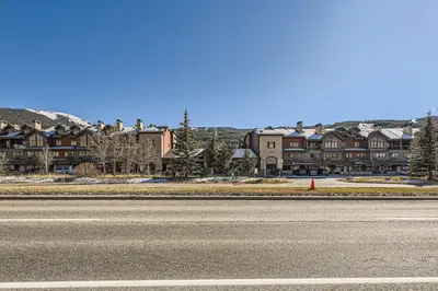 an empty road in front of a large building at 5023 Gateway condo in Keystone