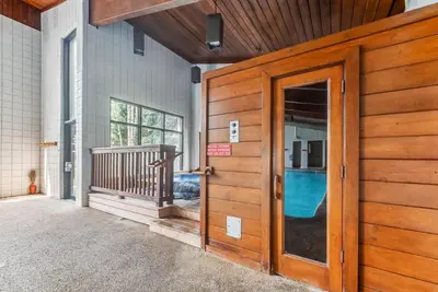 an entrance to a house with a wooden door at Keystone Retreat with Resort Amenities in Keystone