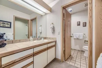 a bathroom with a sink and a toilet at Ski Run 307 - Mountain House Keystone in Keystone