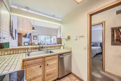 a kitchen with a sink and a counter top at Ski Run 307 - Mountain House Keystone in Keystone