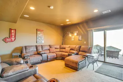 a large living room with a large couch and chairs at Mtn Views and Private Hot Tub Granby Group Getaway! in Granby