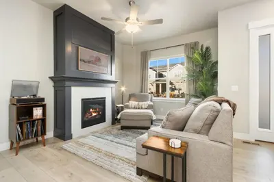 a living room with a couch and a fireplace at NOCO Retreat with King Beds, Fireplace, Scenic Trails in Loveland